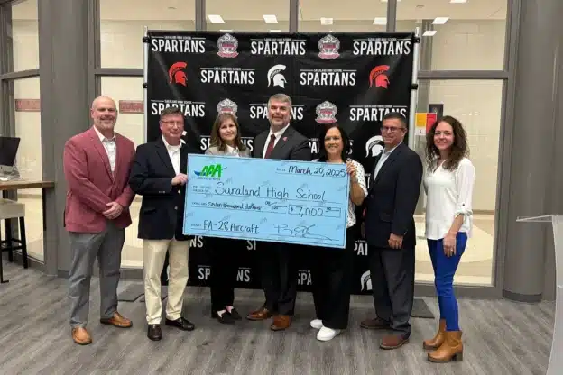 Check donation at Saraland High School